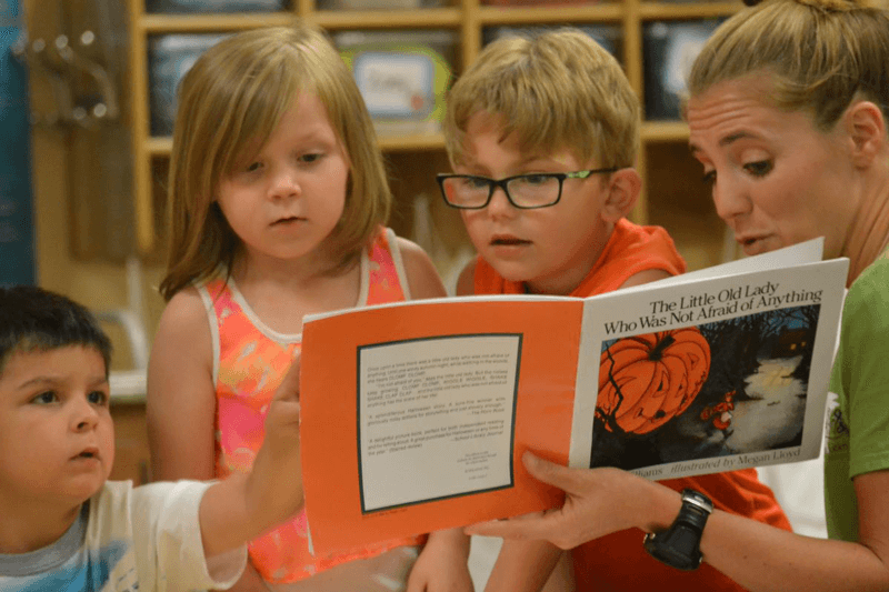 Paragould office kids hearing a story